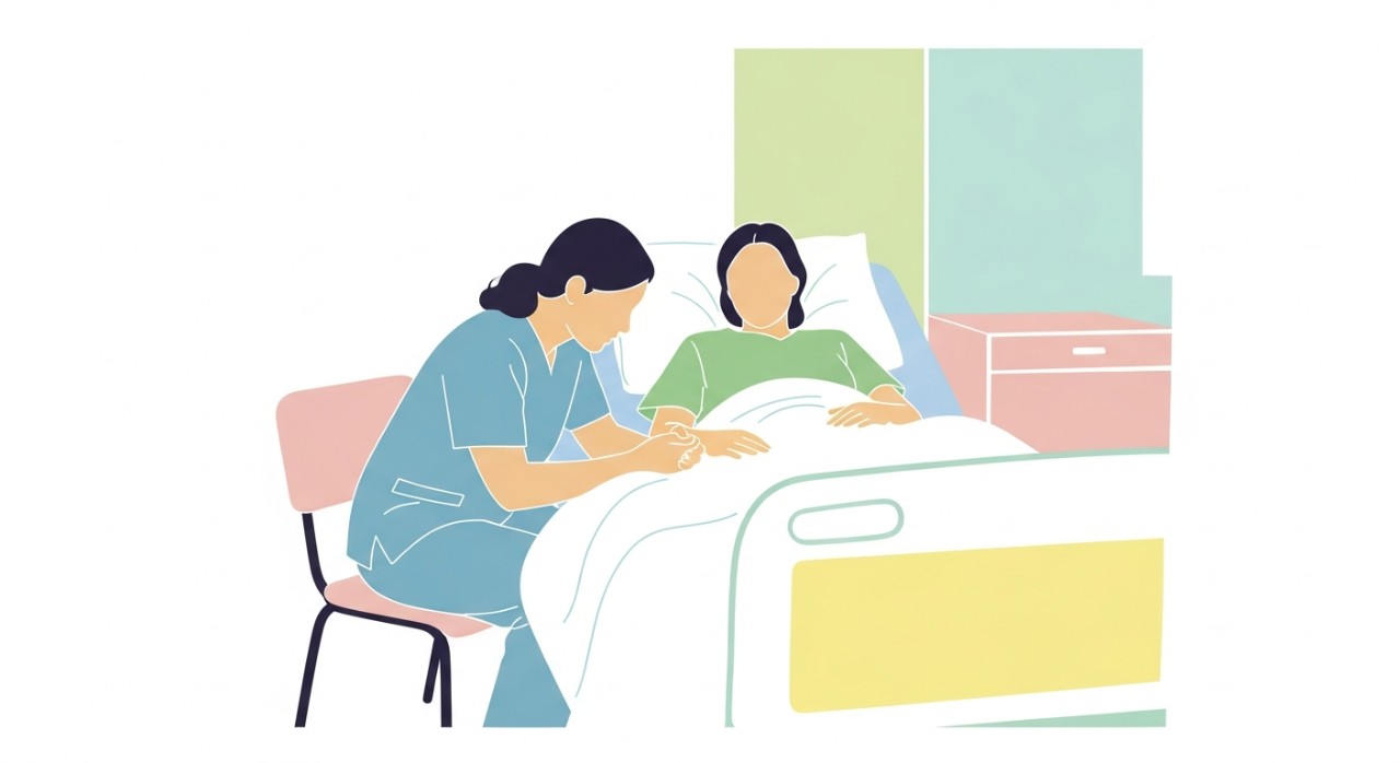 Jadual Masa Melawat Pantai Puteri Hospital Ipoh 2026 1 Seorang pelawat sedang berbual dengan pesakit di katil hospital dengan sopan