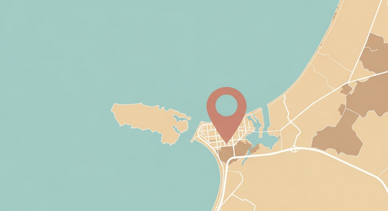 Pin lokasi besar diletakkan di atas peta minimalis kawasan pantai yang menyerupai Kuala Terengganu.