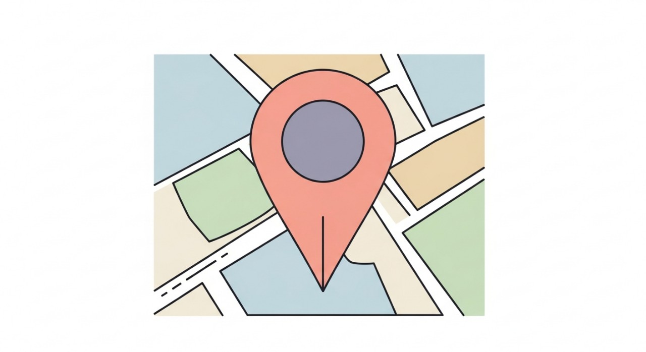 Ikon pin lokasi berwarna hijau dan biru di atas peta bandar yang ringkas.