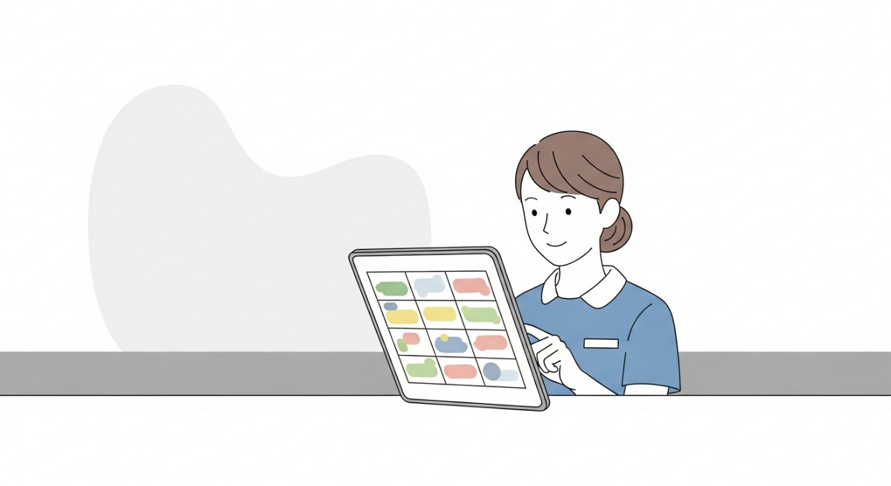 Seorang petugas kesihatan sedang menyemak waktu janji temu dan jadual harian di kaunter.