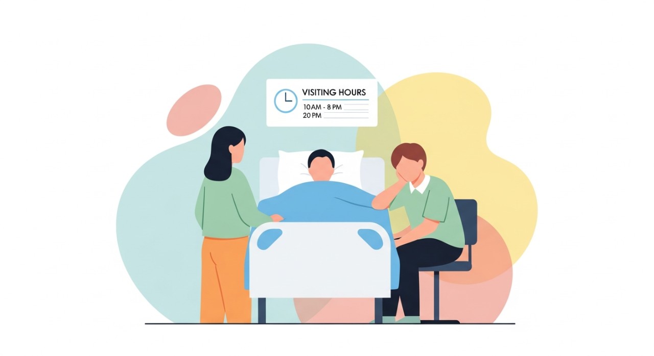 Dua orang sedang melawat pesakit di wad hospital pada waktu melawat yang ditetapkan.